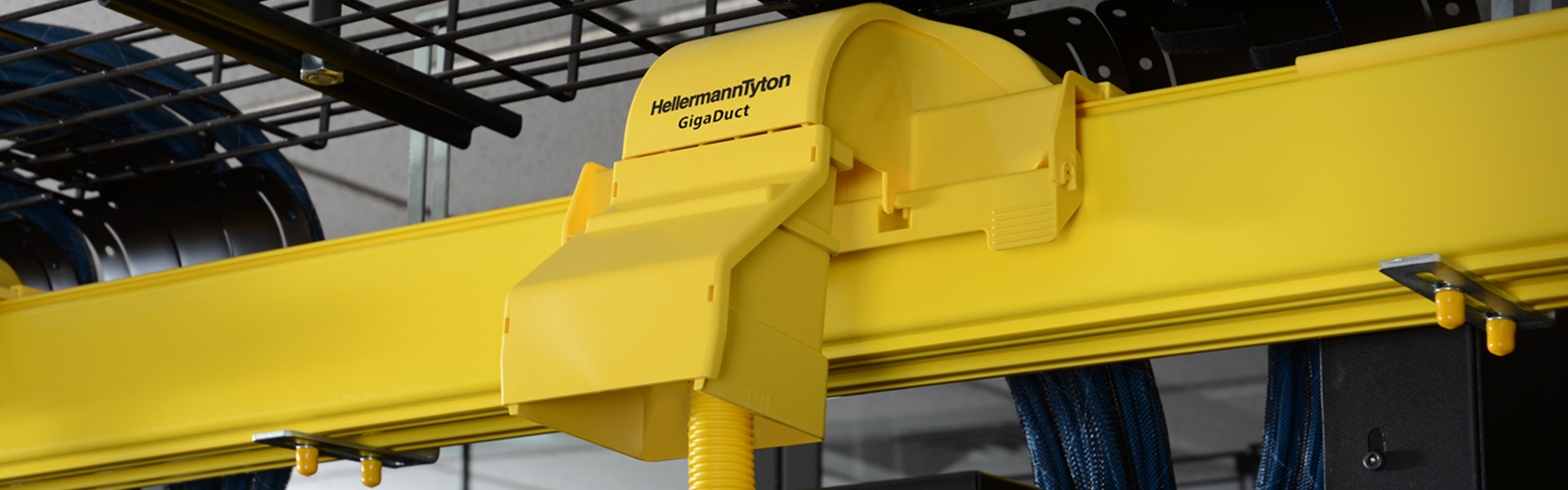 HellermannTyton GigaDuct fibre raceway installed above network cabinets